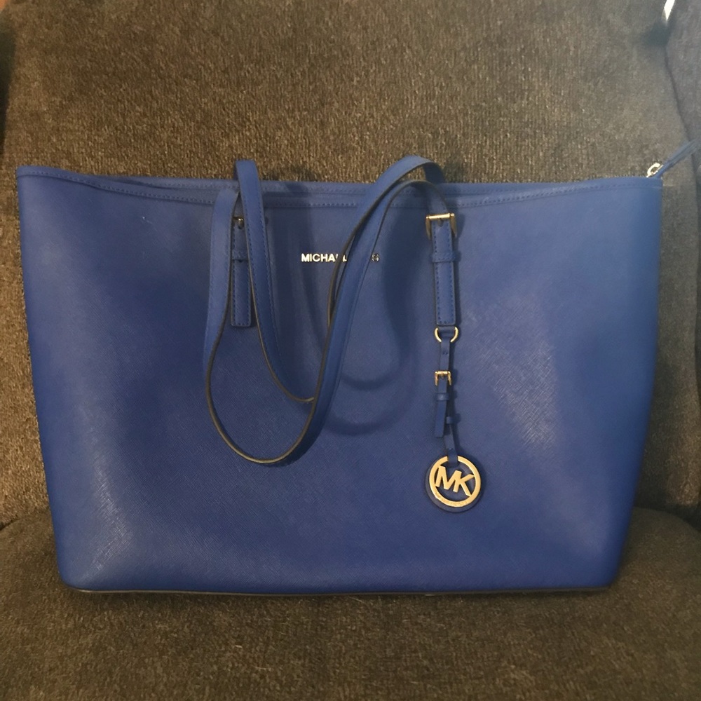 Michael Kors travel bag with laptop sleeve